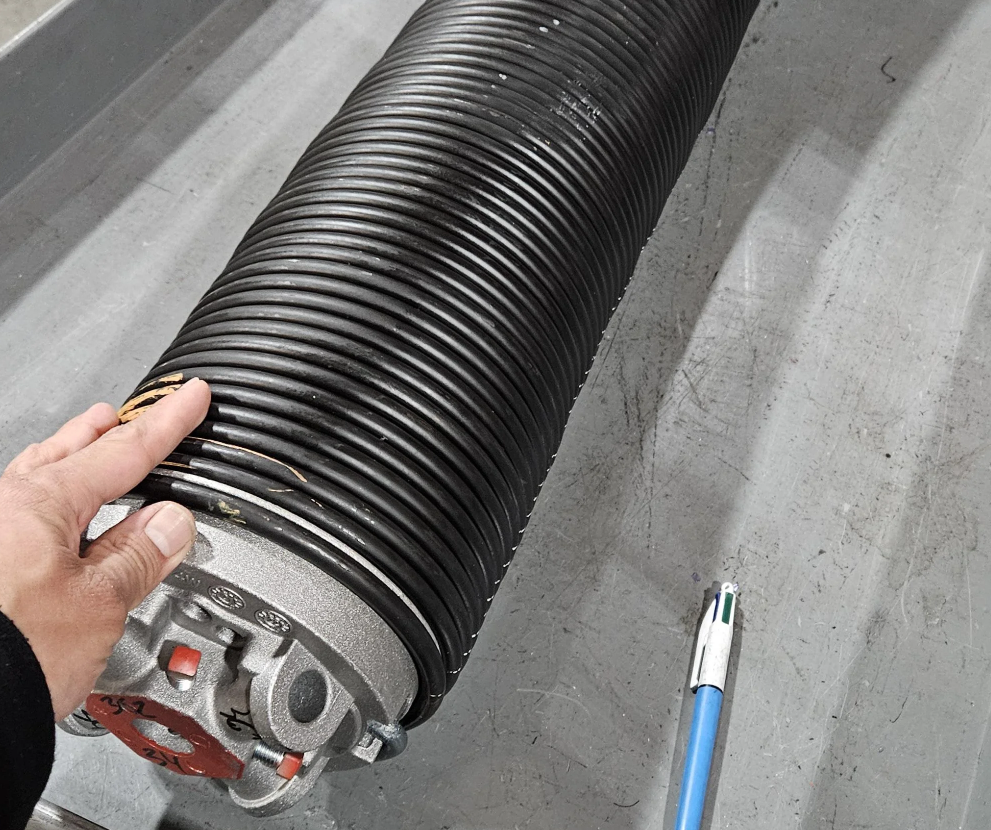 Top Warning Signs of a Broken Spring in Your Garage Door